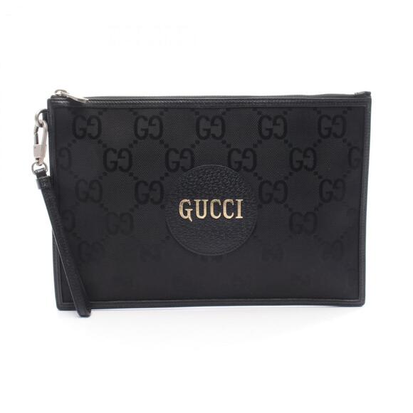 Gucci Off the Grid GG pattern clutch bag in